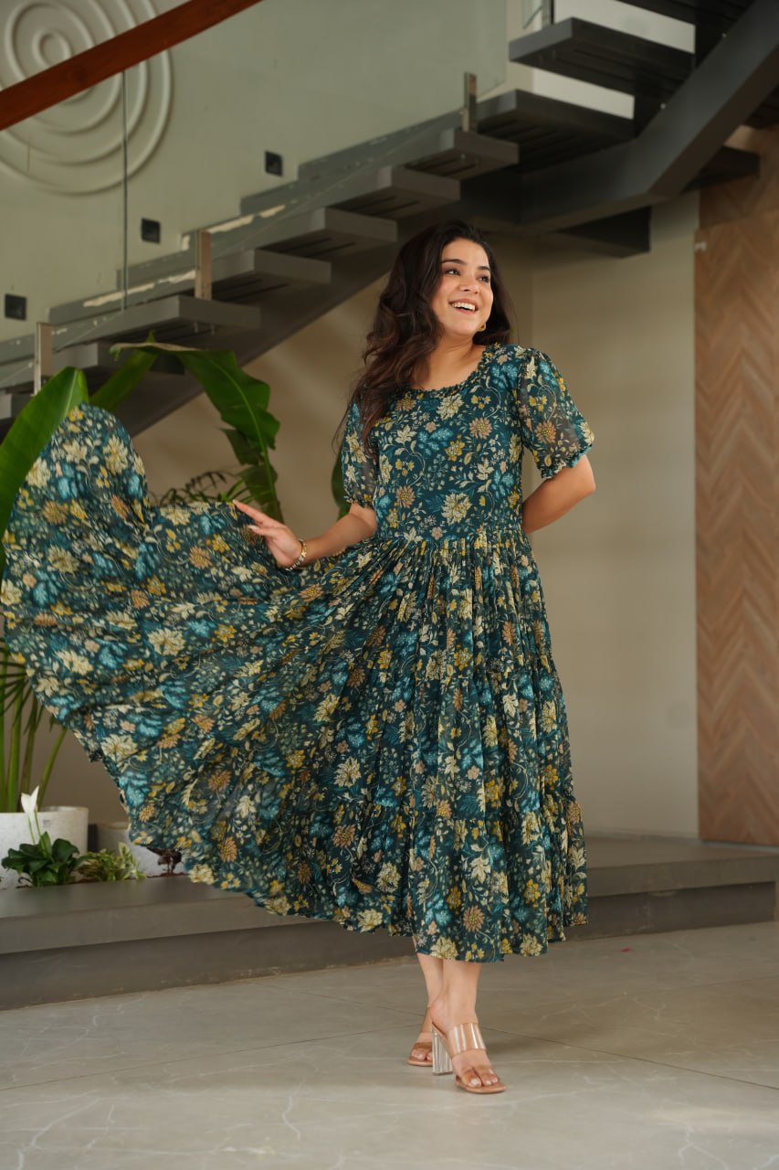 Vikarni Green Printed Anarkali Gown in faux georgette with 12-meter flair – perfect ethnic wear for women, long gown for women, printed gown for girls, Anarkali gown for wedding, georgette gown for festive wear, Indian dress for women, traditional wear for haldi ceremony, party wear gown online, readymade gown under 1000, stylish green ethnic gown for mehndi function.